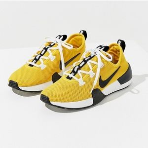Yellow Nike sneakers